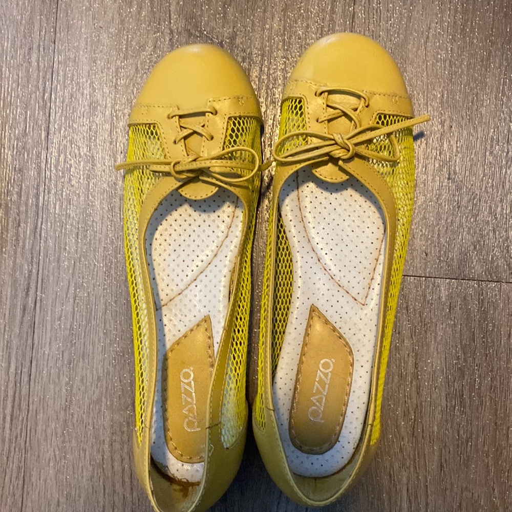 Like new.  Never worn  Passo yellow leather and mesh flats. Size 7 1/2
